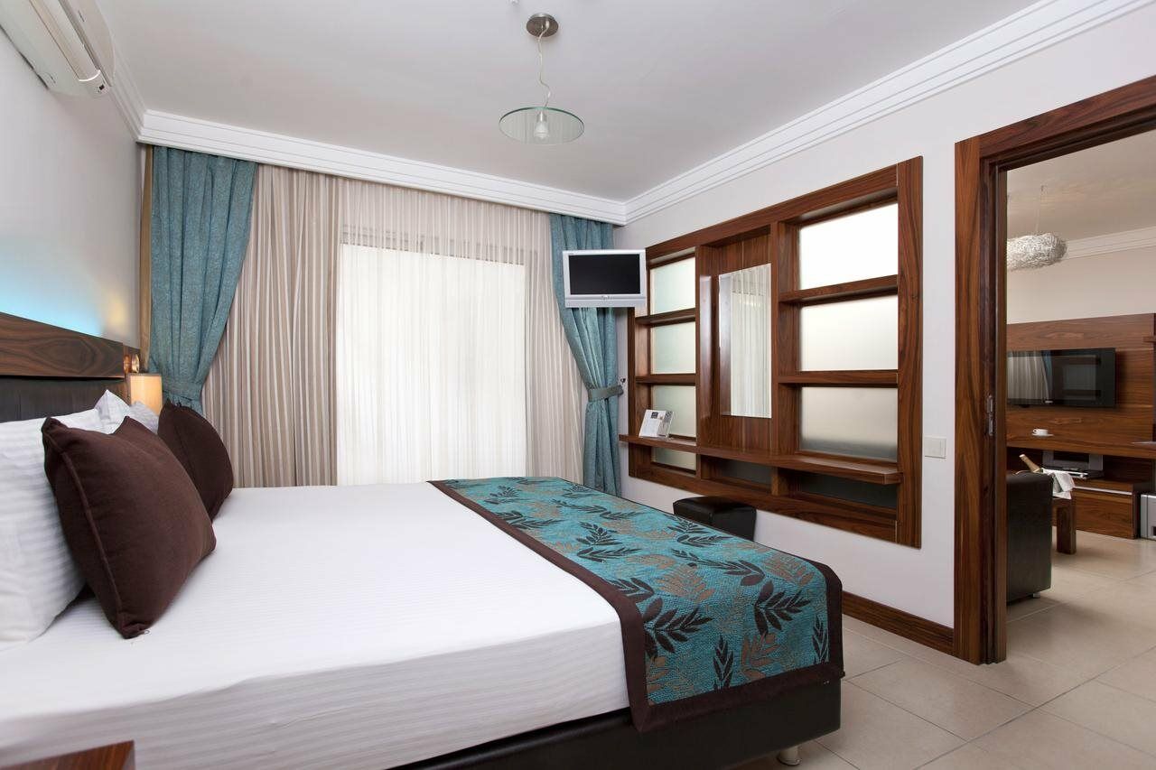 מלון שארם א-שייח Xperience Kiroseiz Aquapark Premier-Naama Bay מראה חיצוני תמונה A bedroom at the hotel